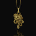 Load image into Gallery viewer, Silver Medusa Skull Pendant, Snake Necklace Design, Memento Mori Reminder, Symbol of Power & Mystery Gold Finish