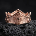 Load image into Gallery viewer, Rose gold plated Targaryen dragon ring on textured volcanic rock, detailed macro product shot with soft warm reflections and bold fantasy house symbolism.
