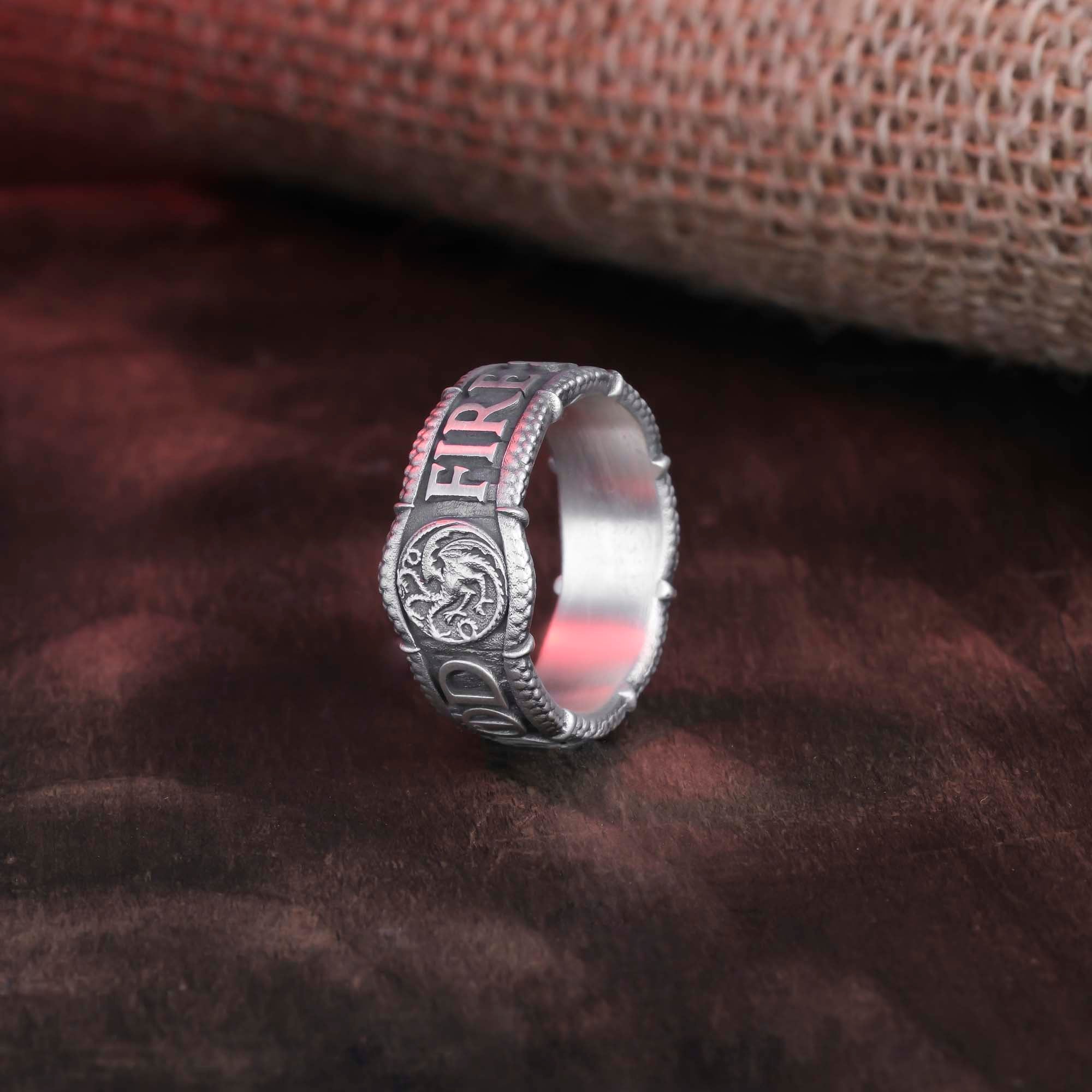 Detailed view of the band with the Fire and Blood mantra, signifying the legendary Targaryen house.