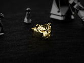 Gold-plated puma ring representing strength and stealth.