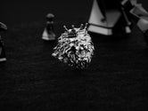 Rhodium-plated lion ring with sculpted mane and fierce details.