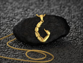 Gold-plated tail charm, elegant scorpion-inspired jewelry.