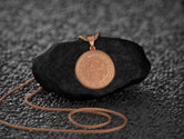 Rose gold-plated Benedict medal, elegant spiritual piece.