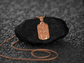 Load image into Gallery viewer, Rose gold-plated crucifix necklace, warm faith expression.
