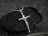 Jesus on the cross necklace, detailed craftsmanship in silver.