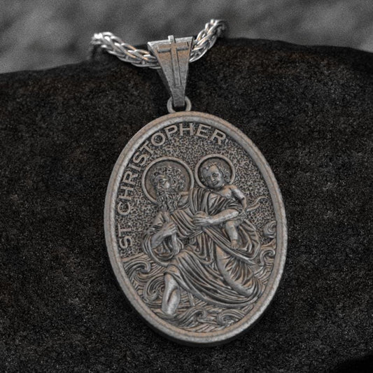 Catholic medal of St. Christopher, patron of travelers.