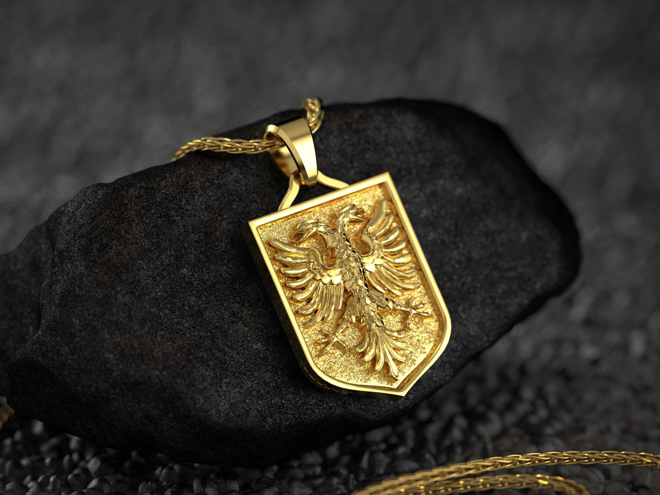 Gold-plated double eagle pendant representing Albanian heritage,