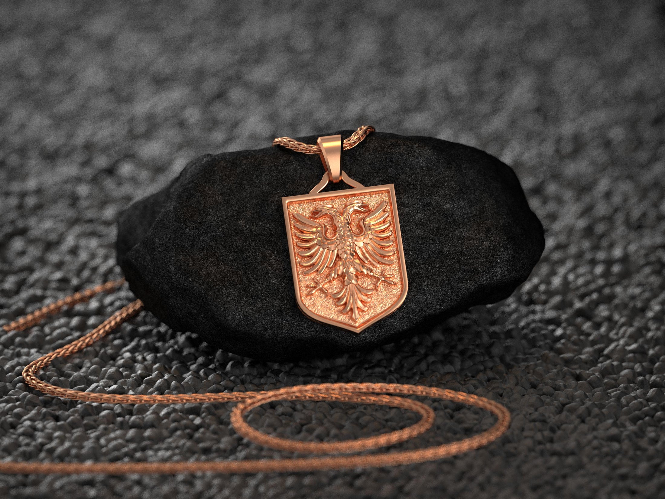 Warm-toned rose gold Balkan eagle pendant with heritage detail,