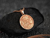Rose gold plated coiled serpent necklace with Eastern myth style,