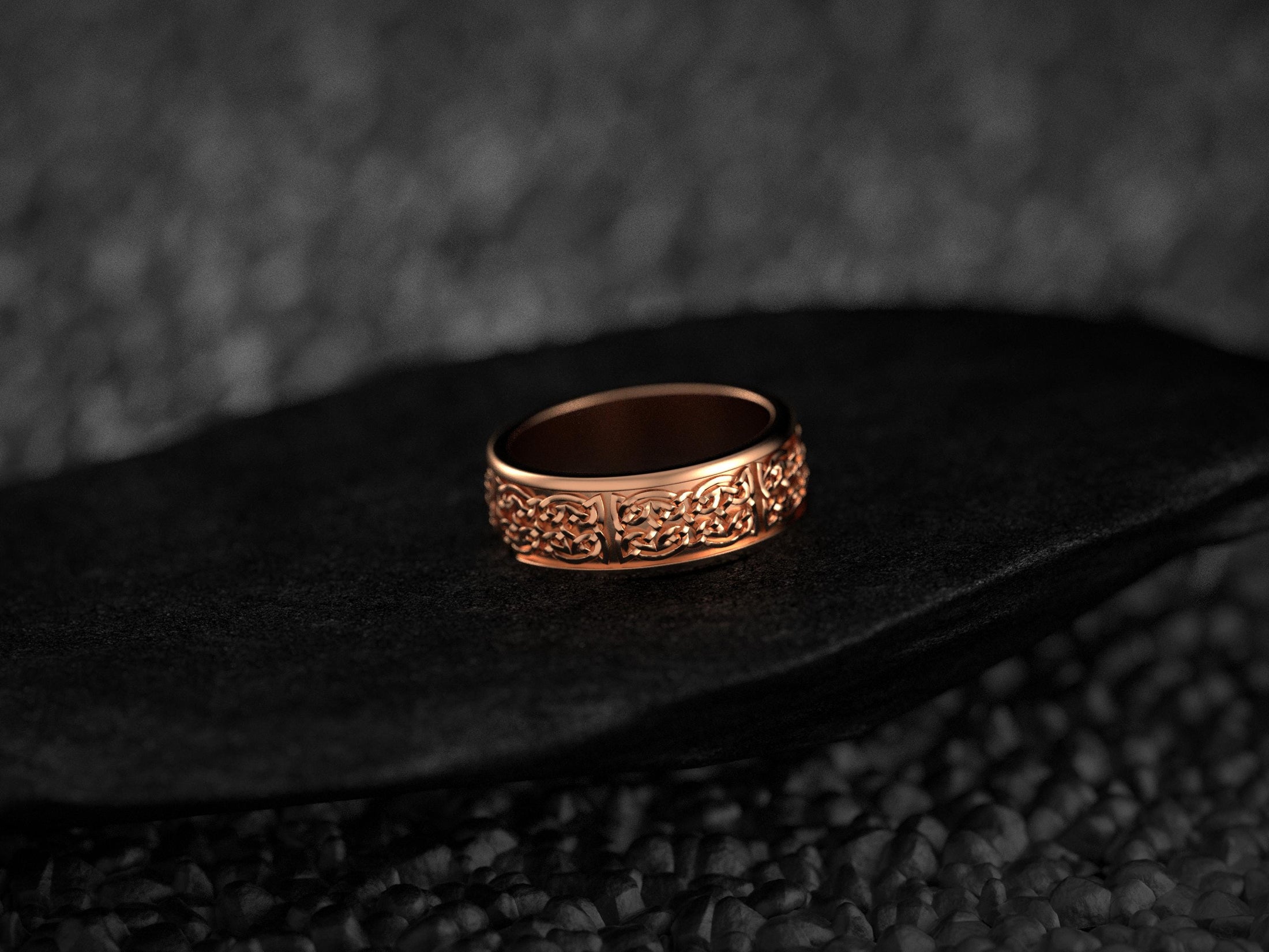 Rose gold Celtic rings with ancient knotwork,