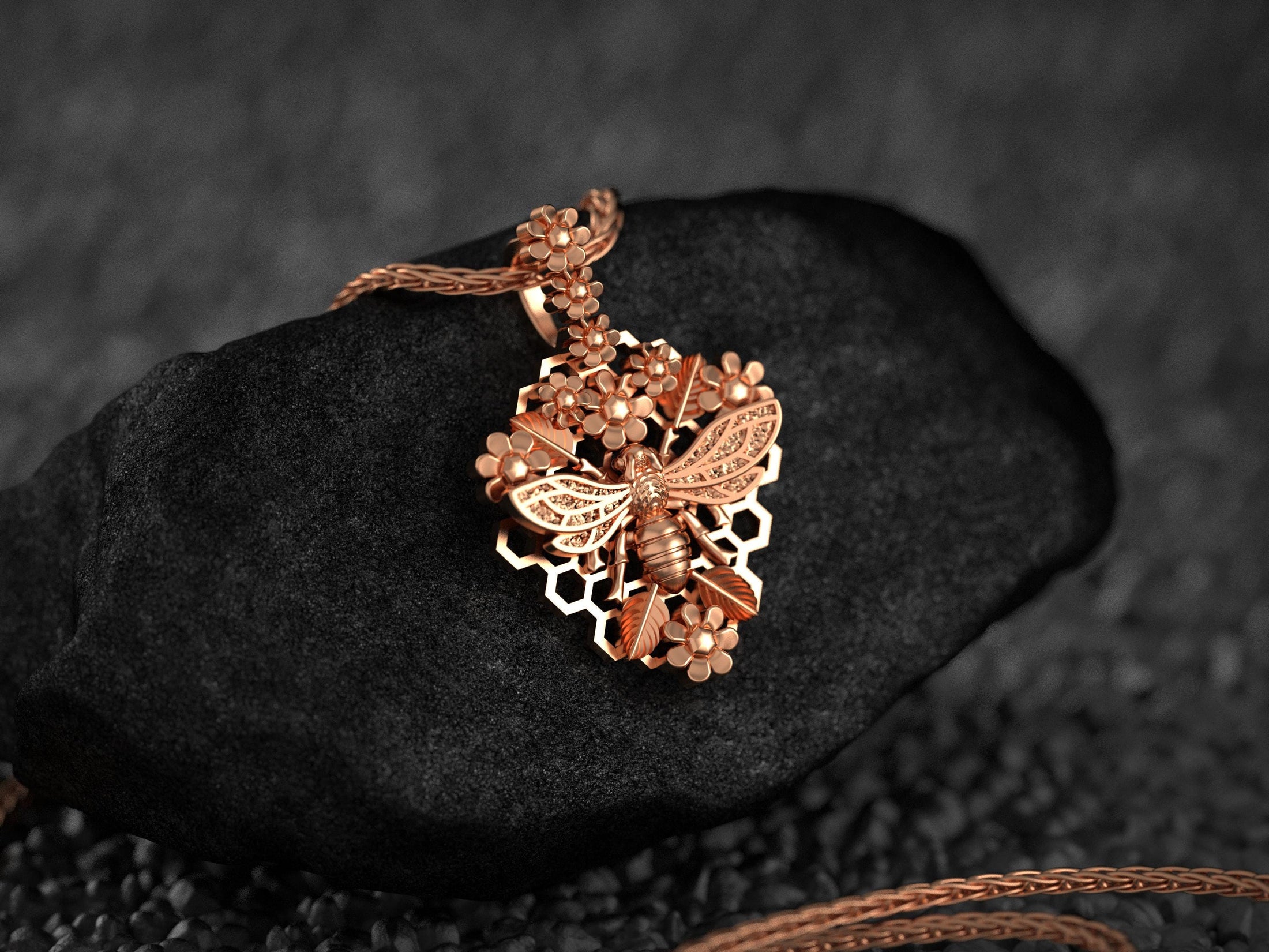 Rose gold bee necklace with honeycomb floral frame,