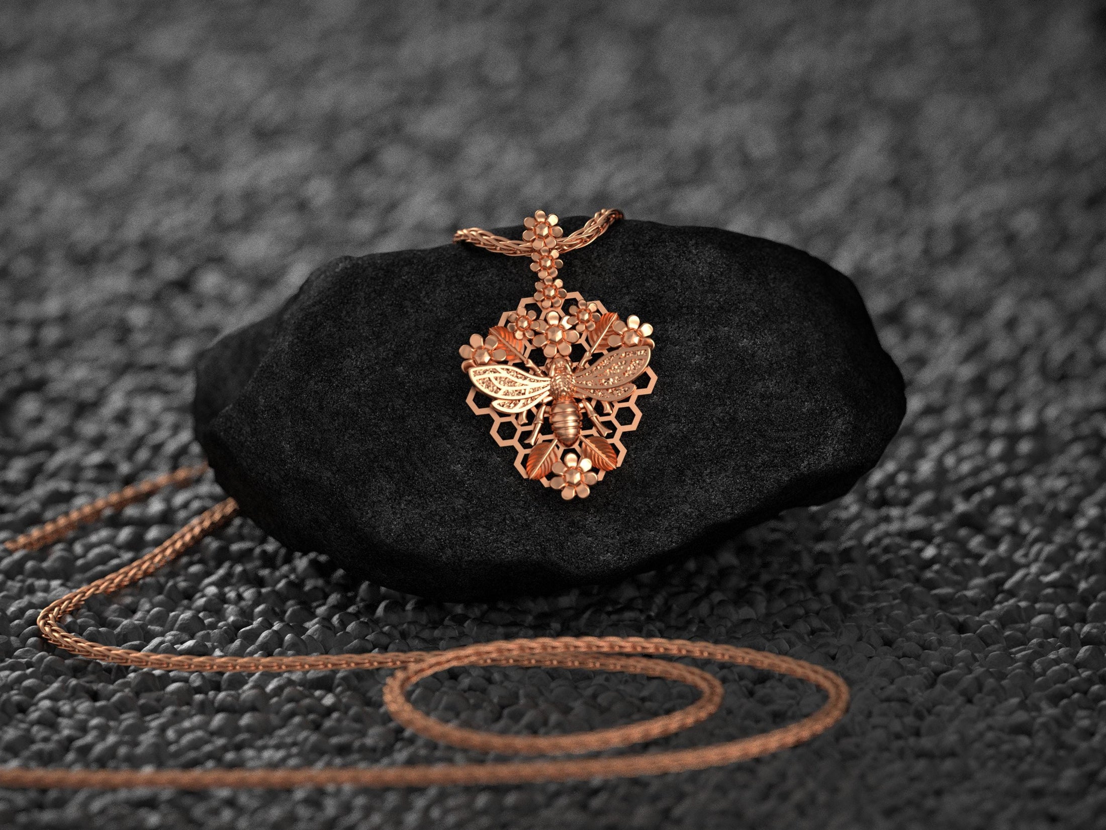 Rose gold bee necklace with honeycomb floral frame,