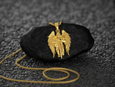 Gold-plated guardian angel pendant, powerful faith symbol.