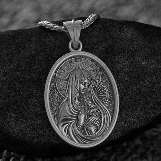 Close-up of 925 sterling silver Virgin Mary and Child Jesus pendant necklace