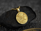 Gold plated dragon amulet pendant, representing protection and wisdom,