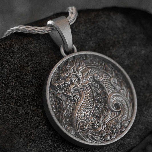 Oriental dragon medallion necklace with detailed serpentine pattern,