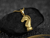 Gold plated chess knight head necklace,