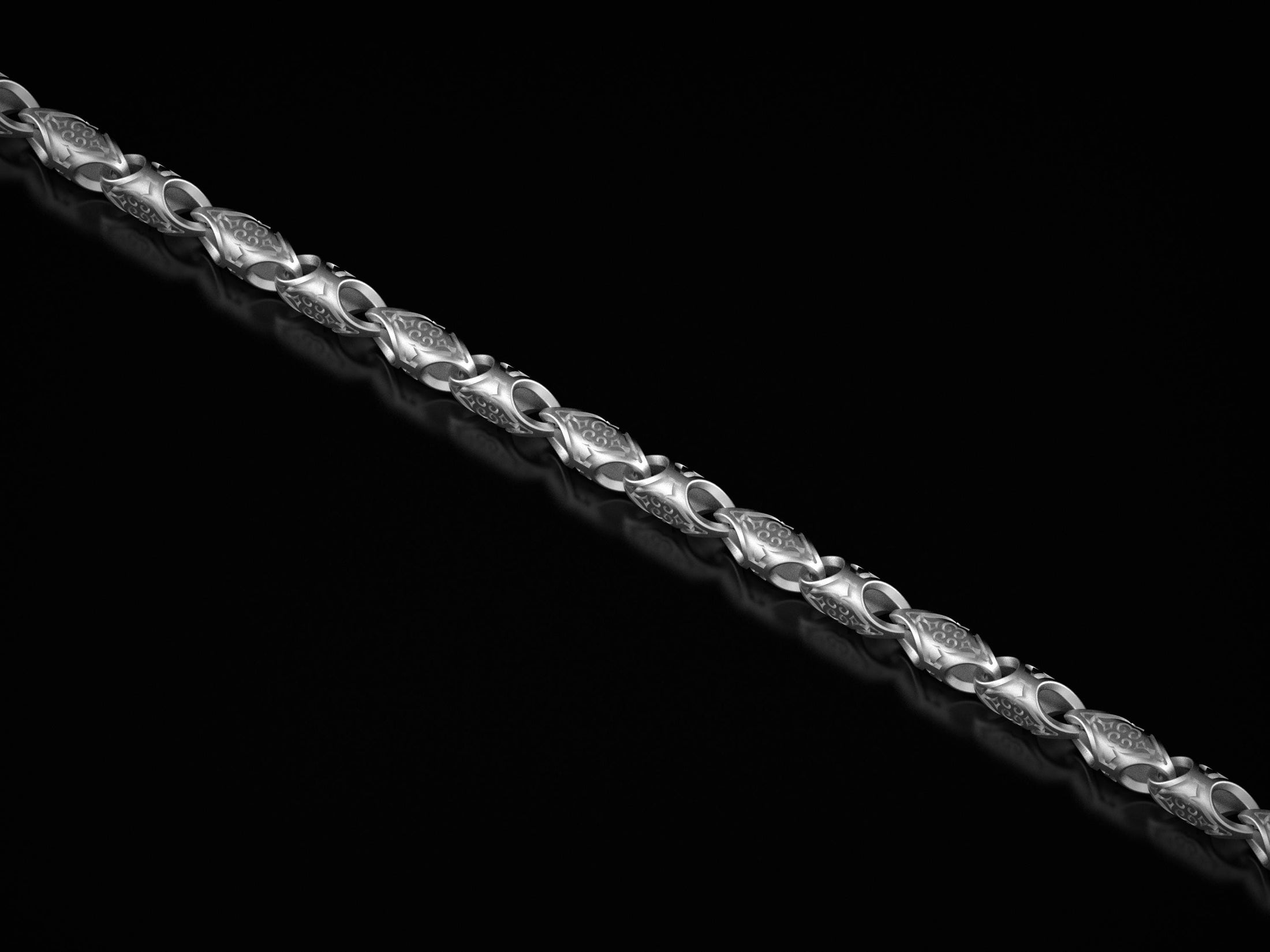 Polished silver ornamental chain in decorative scroll design