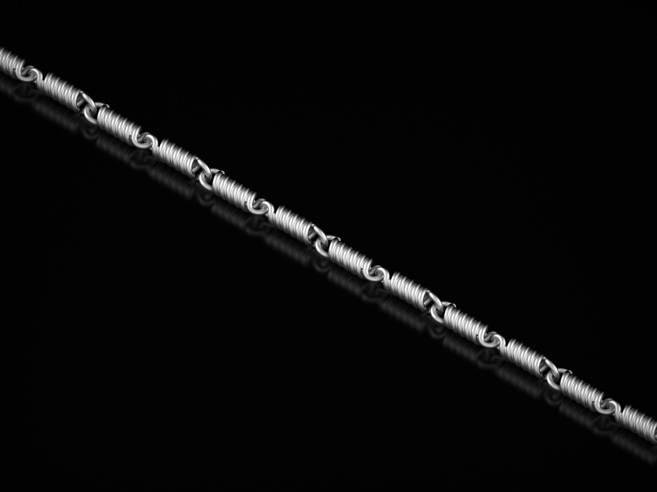 Polished silver spiral coil chain close-up