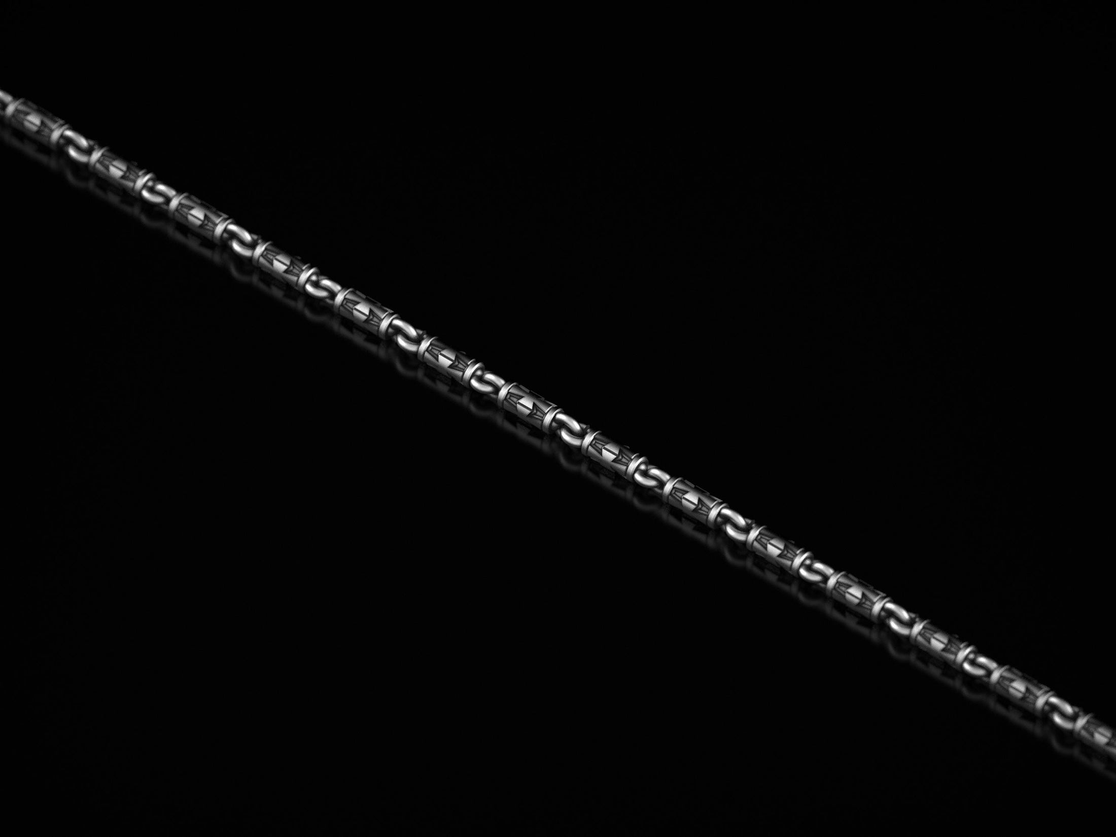 Geometric tube chain featuring Christian cross pattern,