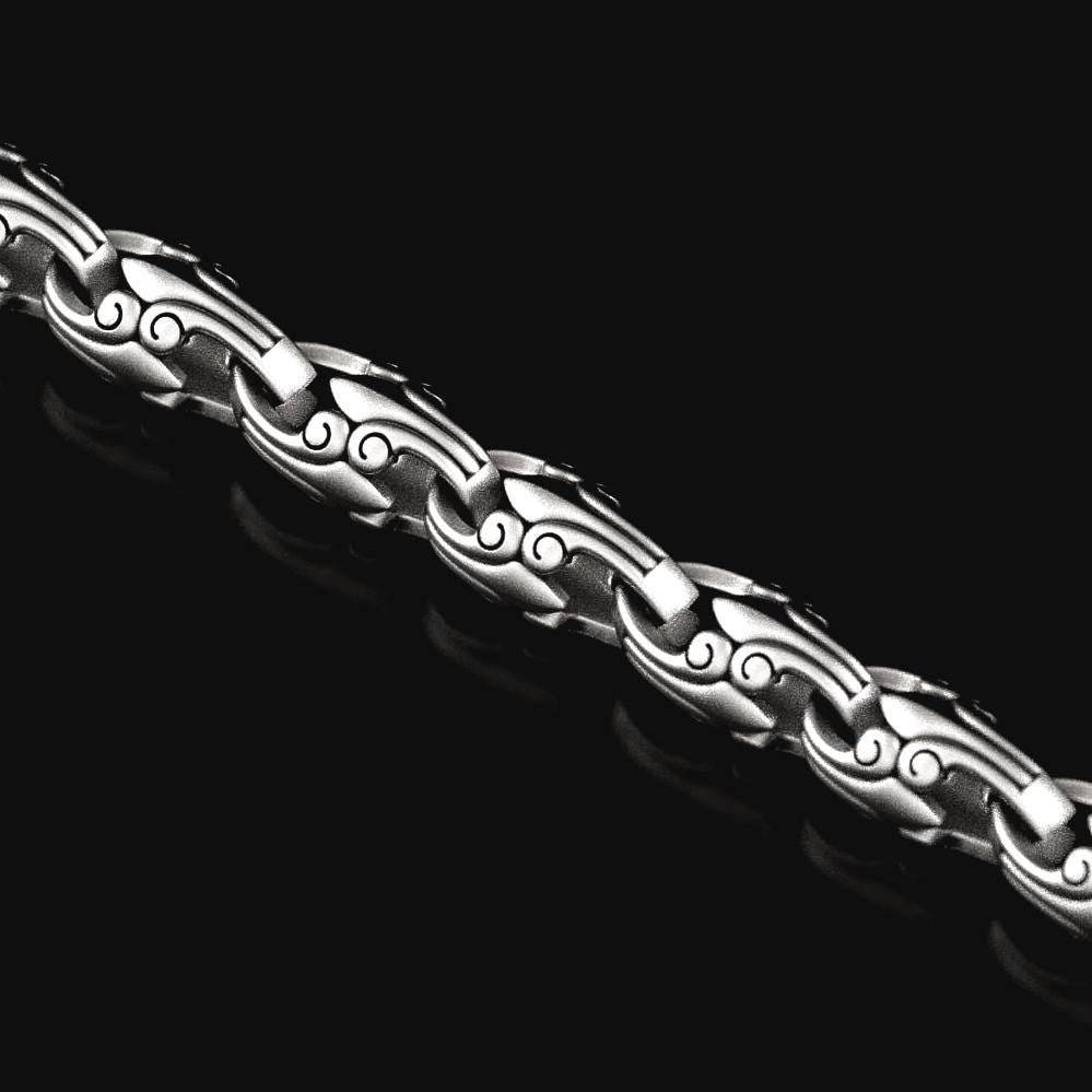 Close-up of oxidized geometric silver chain link,