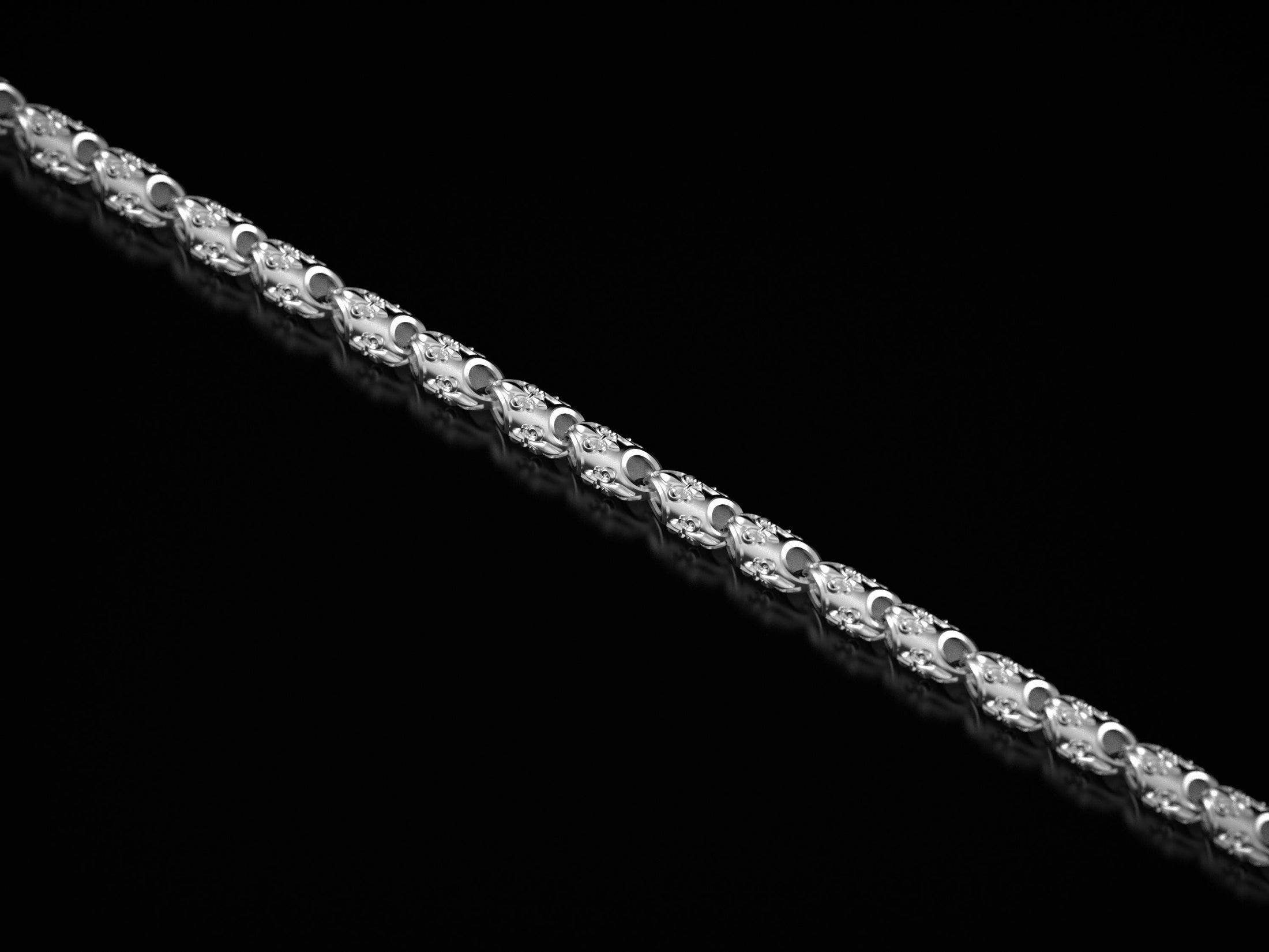 Rhodium plated version with detailed royal motif