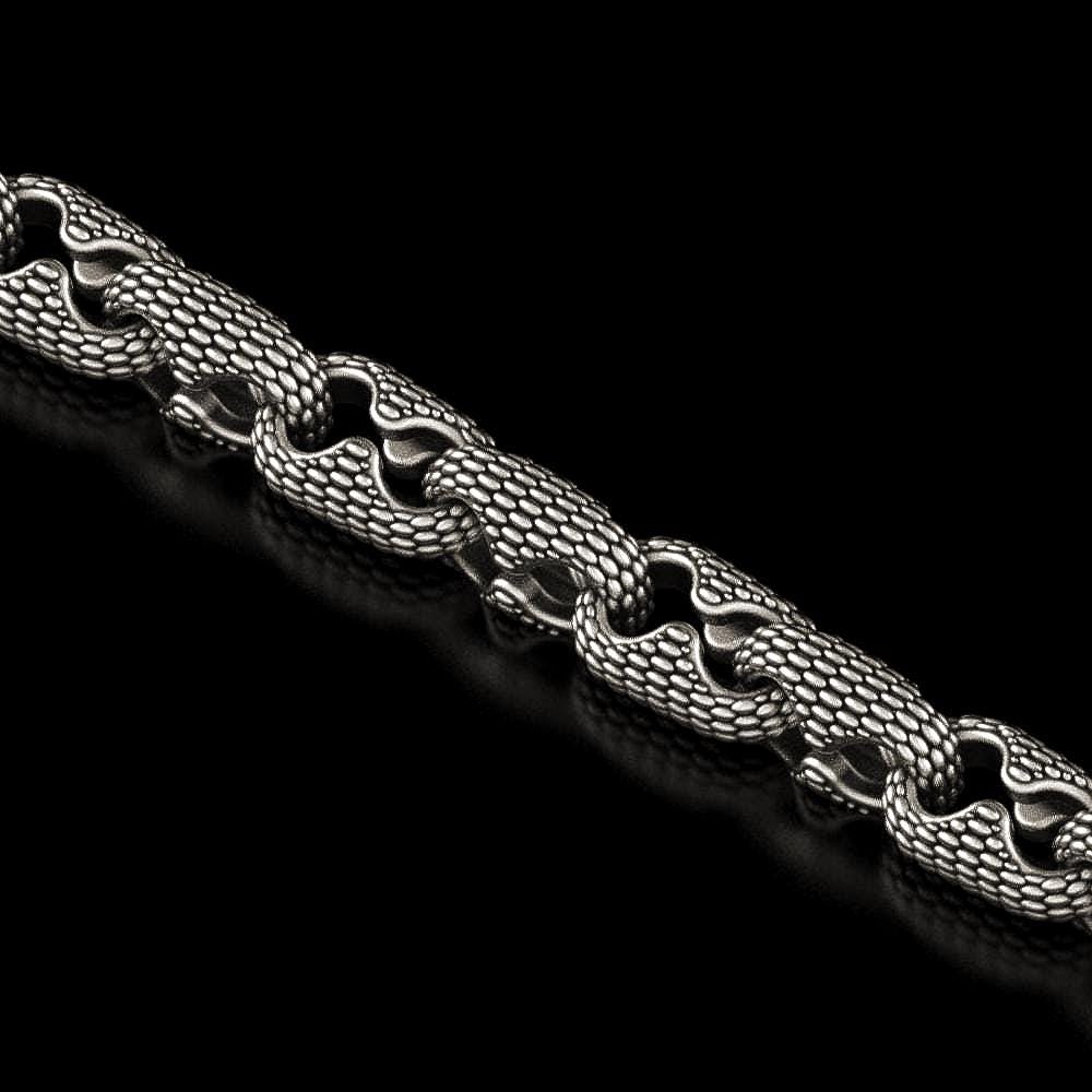 Close-up of snake scale pattern chain links in silver