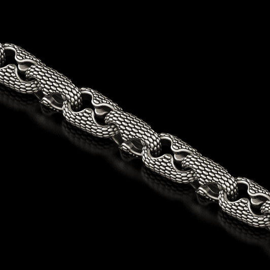 Close-up of snake scale pattern chain links in silver