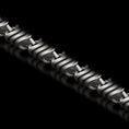 Load image into Gallery viewer, Close-up of spiral-pattern silver chain link
