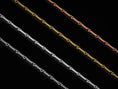 Load image into Gallery viewer, Mixed finish options of the twisted wire chain on black background

