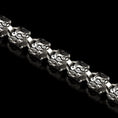 Load image into Gallery viewer, Cougar head detail in oxidized silver links
