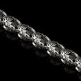 Load image into Gallery viewer, Solid silver four-leaf clover chain close-up
