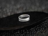 Close-up of slanted line texture detail on ring