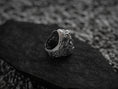 Load image into Gallery viewer, Side view of warrior head ring showing carved temple accents,
