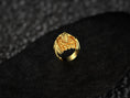 Load image into Gallery viewer, Front view of gold-plated dragon and skull ring.
