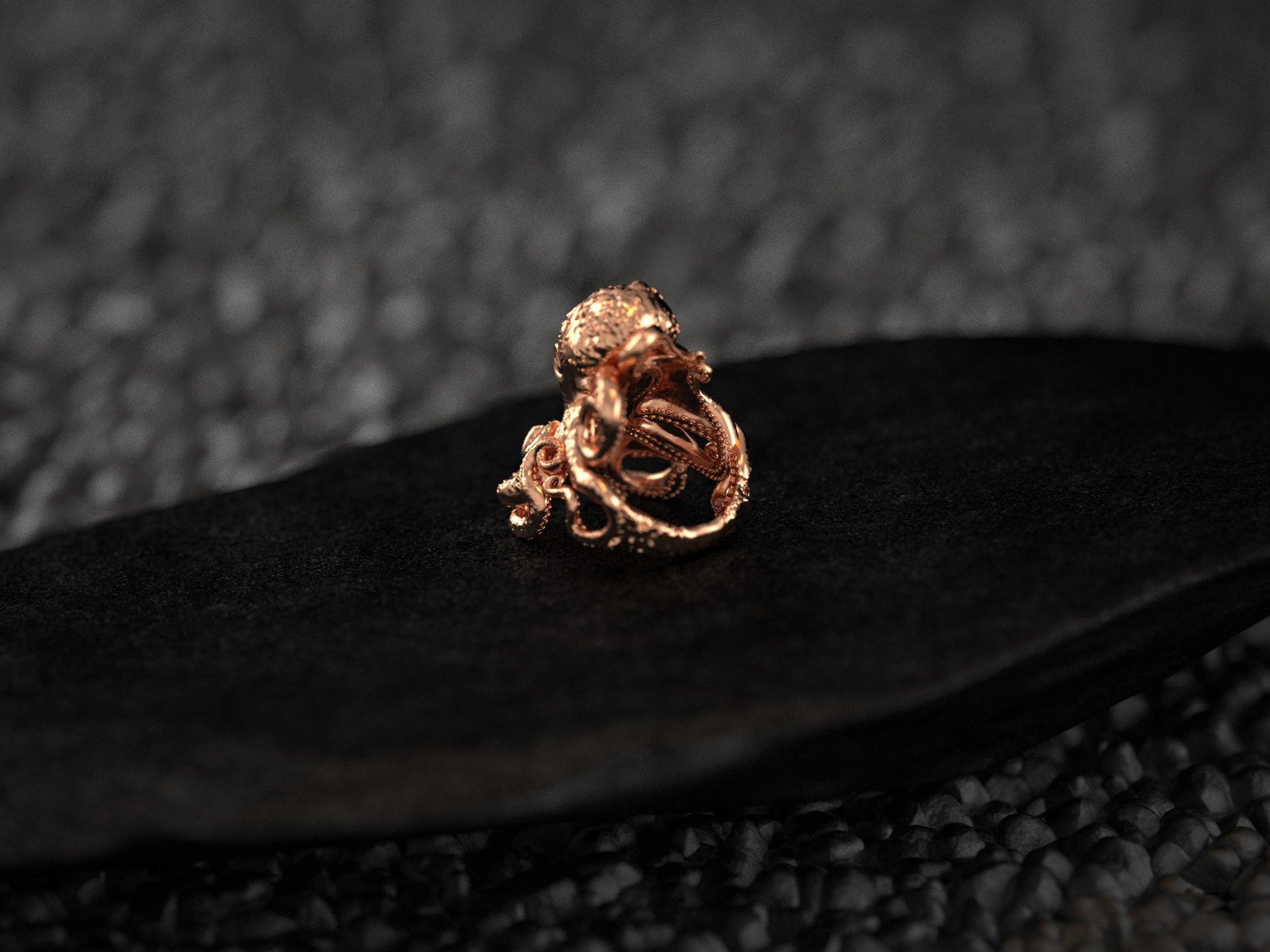 Interior view of rose-gold octopus ring band.