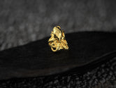 Front profile of gold-plated octopus signet ring variant.