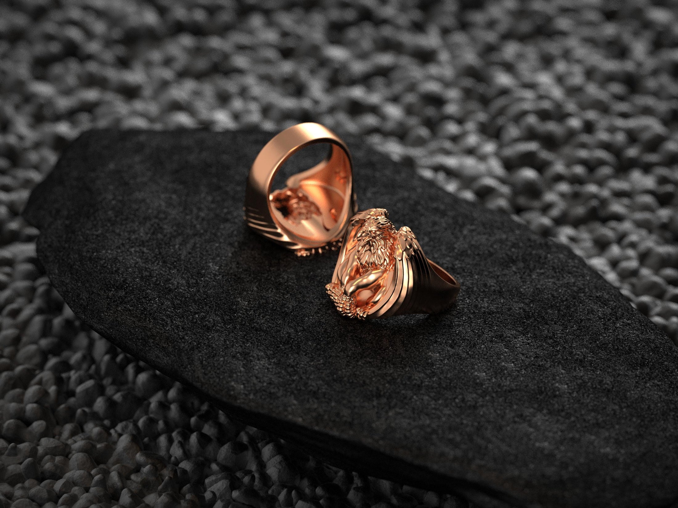 Interior view of rose-gold griffin signet ring band.