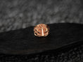 Load image into Gallery viewer, Front view of rose-gold anchor & sharks signet ring.
