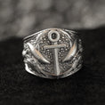Load image into Gallery viewer, Close-up of sterling silver anchor and sharks signet ring on black stone.
