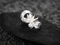 Load image into Gallery viewer, Interior band view of the sterling silver ring showing maker’s hallmark on the smooth inner surface.
