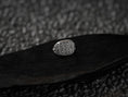 Load image into Gallery viewer, Front-view of the oxidized silver signet ring engraved with the five-cross Jerusalem motif, set on black stone.
