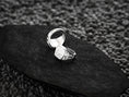 Load image into Gallery viewer, Interior band shot of the sterling silver ring revealing its custom grid-patterned comfort fit.
