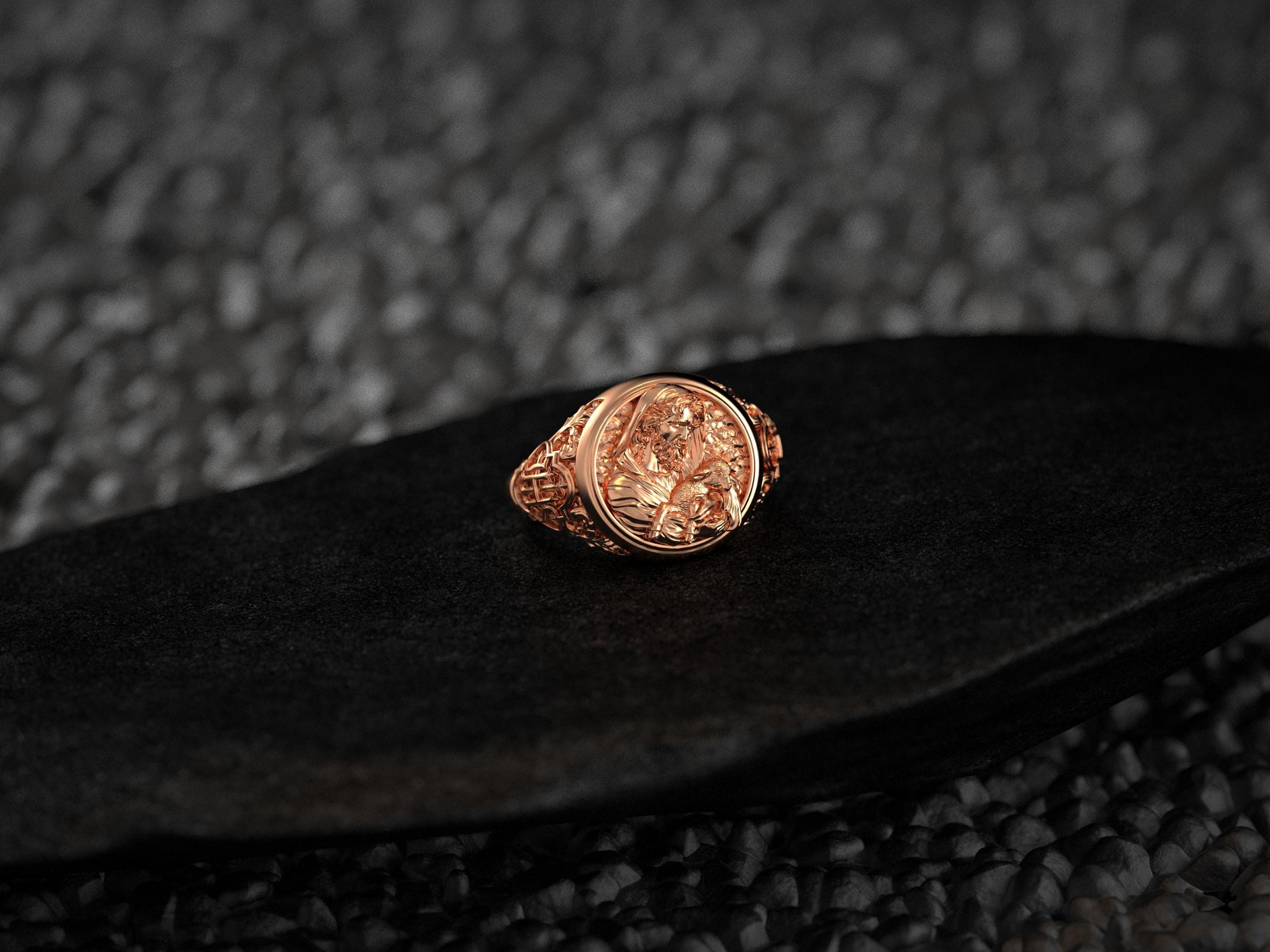 Front view of the 18K rose gold–plated Good Shepherd ring highlighting its rosy metallic finish.