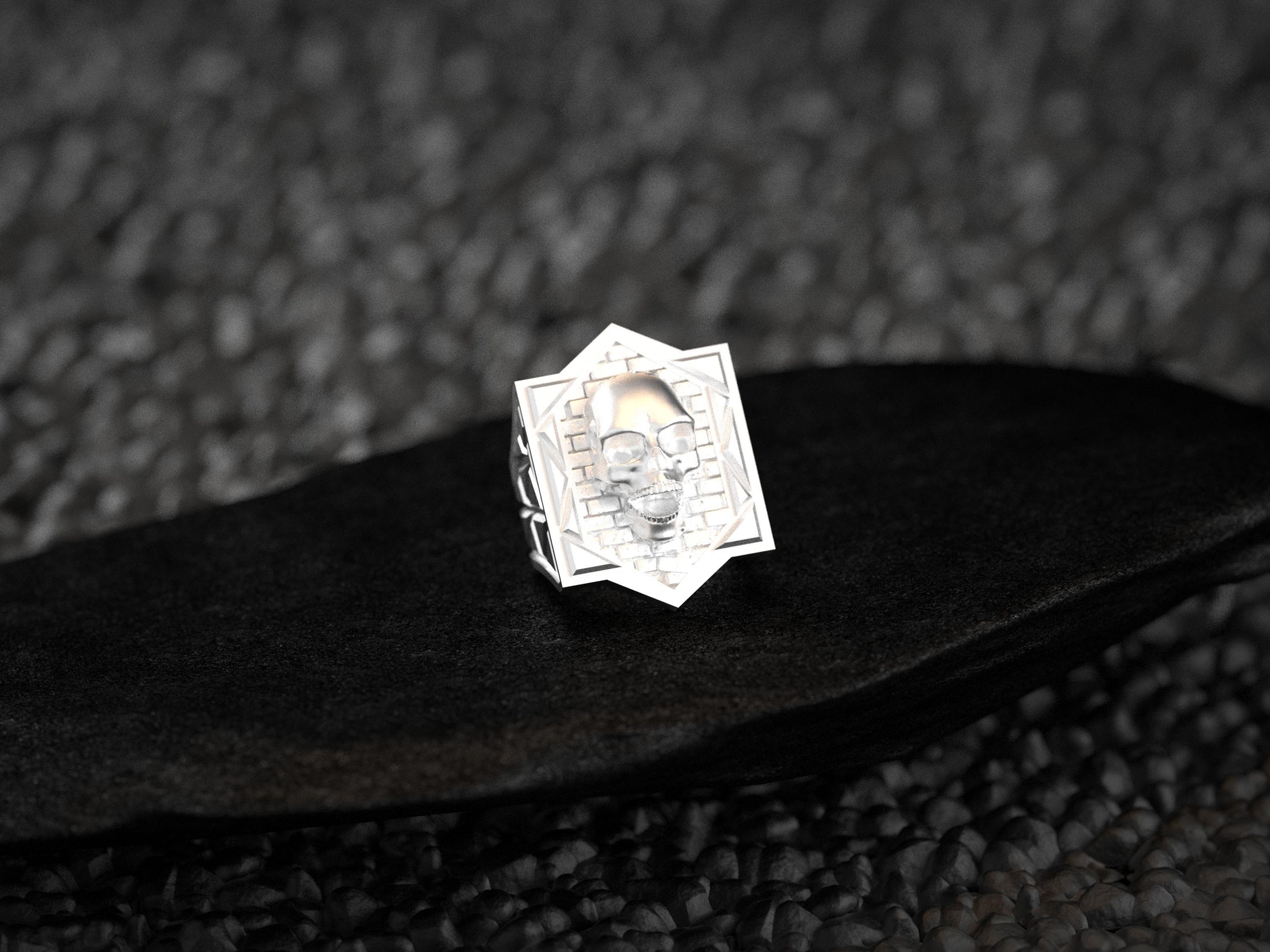 Front view of the ring plated in lustrous 18K yellow gold, emphasizing the hexagonal brickwork and polished band.