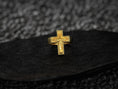 Load image into Gallery viewer, Frontal view of the yellow-gold plated version, emphasizing the gleaming cross silhouette and Sacred Heart detail.
