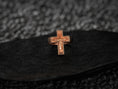 Load image into Gallery viewer, Frontal view of the rose-gold plated version, showing the subtle warm hue on the Christ figure and cross frame.
