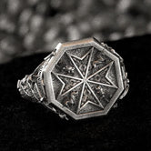 Oxidized Finish Maltese Cross Signet Ring on black background