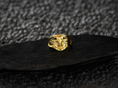 Gold plated Elephant Ring highlighting tusks and textures