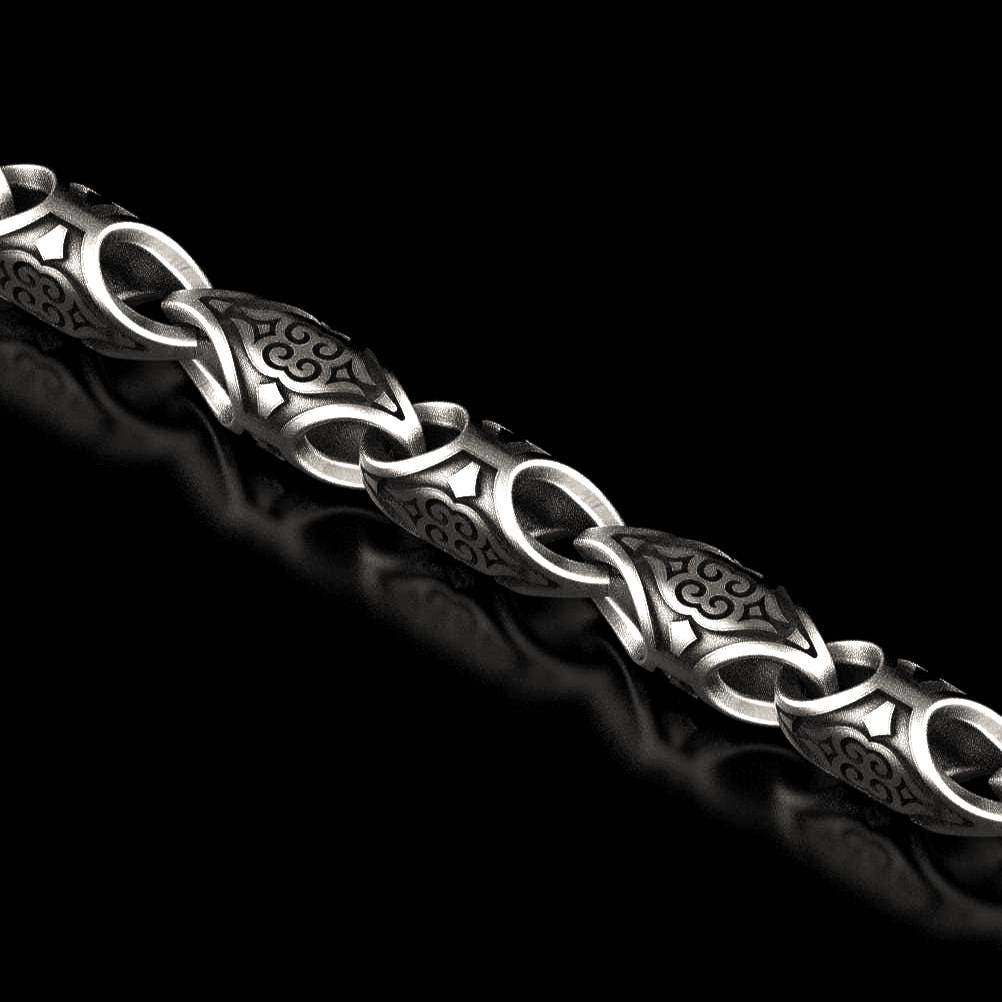 Oxidized scroll link chain with antique engraved patterns